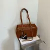 A nova bolsa tote de grande capacidade de Shuai Mi, uma bolsa de ombro casual e estilosa, uma bolsa de axila moderna e fashion