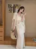 Elegante Conjunto de Moda para Mujer de Punto de Manga Larga + Camisola + Falda Tres Piezas - Otoño 2026