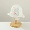 Chapéu de pescador para bebê pastoral atacado moda estampa pequeno fresco chapéu de sol dois lados disponíveis chapéu infantil versão coreana