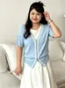 Top de punto de color block falso dos piezas para mujer de talla grande, otoño 2026, cárdigan casual suelto de manga corta para mujer de talla grande