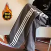 Pantalones para Hombre Otoño e Invierno con forro polar Engrosados Estilo Americano Marca de Moda High Street Sueltos Pierna Ancha Rectos Modernos Casuales Deportivos