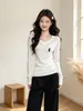 Camiseta feminina de manga longa com ombros caídos e decote V, novo estilo primavera/outono, casual, versátil, slim fit, top quente, camada base