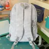 Mochila azul marino de color claro contrastante con textura tejida para estudiantes, estilo universitario americano, adecuada para uso diario casual, viajes y escuela