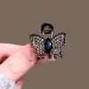 Pinza de pelo negra de alta gama para patillas laterales y flequillo, nuevo modelo de pinza de garra de mariposa con diamantes de imitación de metal, tamaño pequeño