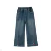 Pantalones vaqueros acampanados de niña con botones y lazo de colores, nuevo estilo primavera/otoño 2026, pantalones casuales de estilo coreano modernos para niños mayores