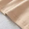 Atacado de roupas femininas transfronteiriças 2026 outono novo sexy hot girl ombro a ombro manga longa justa T-shirt curta