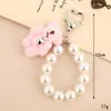 1PC 10cm Lindo Urso Coelho Pelúcia Enchido Chaveiro Pelúcia Pérola Chaveiro Decoração Acessórios Para Mochila Bolsa Carteira Chaveiro de Bolsa Estilo Luxo Branco/Rosa/Cáqui/Marrom