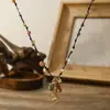 2026 Collar Retro de Cuerda Tejida a Mano con Cuentas de Acero de Titanio para Mujer Diseño de Nicho Estilo Étnico Cadena para Suéter Accesorios de Flor