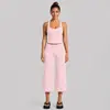 Conjunto de fitness transfronterizo con top de tirantes anchos para yoga, conjunto de pantalones capri de running para fitness que absorben la humedad y se secan rápidamente