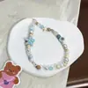 Venta al por mayor del fabricante Nuevo modelo Gato Kt Lazo Cadena para teléfono Colgante de cadena para teléfono con cuentas hecho a mano Decoración para niñas