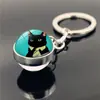 Paraguas amarillo gato negro Gema del Tiempo colgante de llavero colgante de bola de cristal llavero colgante de coche bolsa femenino