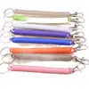 Venta al por mayor de fabricantes Cuerda de resorte de línea telefónica colorida Anti-pérdida Colgante para teléfono móvil Llavero hecho a mano DIY Accesorios de joyería
