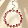 Pulsera de trébol de cuatro hojas colorida de estilo europeo y americano con diamantes completos, sensación de lujo ligero y alta gama, pulsera incrustada de diamantes, joyería exquisita moderna y versátil
