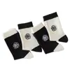 Calcetines Blancos y Negros para Mujer de Caña Media Diseño de Bordado de Flor Camelia Personalizado ins de Moda Estilo Japonés Simples Calcetas Zhuji