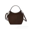 Bolsa tipo balde retrô para mulheres, nova coleção 2026, elegante e prática para o dia a dia, com material de camurça de alta qualidade e um design casual e moderno