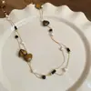 Collar Colgante Gota de Agua Piedra Ojo de Tigre Maillard Estilo Hong Kong Moda Versátil Cadena para Suéter Joyería de Nicho Venta al por Mayor