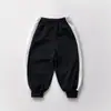 Calça infantil com elástico na cintura, color block, amarração no tornozelo, estilo coreano, coleção outono 2026, unissex, para bebês e crianças maiores, calça esportiva versátil