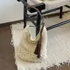 Bolso de Paja Casual de un Solo Hombro con Borlas Nuevo Estilo 2026 Bolso Tejido Hueco Estilo Resort de Playa Bolso de Moda para Mujer