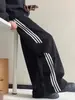 Calça de moletom listrada com três listras masculinas, estilo primavera/outono, marca trendy retrô americana, calça casual de perna larga, modelagem solta, calça esportiva de perna reta