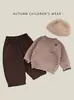 Suéter tejido de otoño/invierno para bebé y niño pequeño con botones en el hombro, suéter de cuello redondo color avena para niños, top moderno para bebés niños y niñas