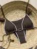 Bikini sexy de estilo europeo y americano con detalles de amarre, un traje de baño de dos piezas de alta gama perfecto para vacaciones y aguas termales, disponible en Amazon