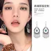 Pendientes de estilo exótico más vendidos, ganchos de oreja clásicos elegantes artísticos vintage, pendientes colgantes de borla de moda huecos versátiles