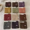 Bufanda de lana tejida estilo coreano, un nuevo diseño de otoño/invierno, cálida, a la moda, versátil, casual, adecuada para estudiantes y parejas, creando un look acogedor y elegante