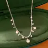 Colar Saturno Pérola Redonda com Zircônia e Contas Prateadas, Corrente para Clavícula de Luxo Leve de Nicho, Acessório de Pescoço Elegante e Requintado de Alta Qualidade