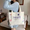 2024 nueva versión coreana de bolso casual de hombro Joker bolso de lona de gran capacidad bolso de moda para estudiantes una generación de cabello