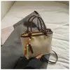 Bolso de Mano Casual de Aspecto Retro Tipo Cubo 2026 Primavera Nuevo de Moda Texturizado para Mujer Elegante Bolso de Hombro Cruzado