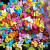 Botón de mariposa de estrella de cinco puntas con hebilla de dibujos animados de plástico para niños, botón de camisa DIY hecho a mano que se puede utilizar