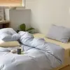 2026 Novo Modelo Conjunto de Quatro Peças 100% Algodão Estilo Nórdico Combinável Temporada Estudantil Conjunto de Lençol de Cama e Lençol com Elástico de Três Peças para Dormitório