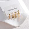 Pendientes de borla de amor con diamantes de oro de 18 quilates y acero inoxidable, estilo Joker de cuatro piezas con hebilla de oreja de alta calidad en color rojo, venta al por mayor