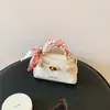Bolso de Mano de Color Sólido para Niñas Estilo Coreano Ins, Bolso de Hombro Mini Compacto para Niños y Niñas, Bolso Infantil Transfronterizo Nuevo