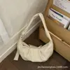 Bolso de Mano Plegado de Diseño de Nicho Bolso tipo Dumpling para el Hombro para Mujer Primavera 2026 Nuevo Color Sólido Bolso de Hombro Tote Transfronterizo