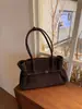 Bolso de mano de cuero de diseño estilo coreano 2026 con hebilla, bolso de piel de vaca, bolso bandolera retro de un solo hombro para mujer, gran capacidad