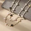 Colección Larga de Collares Superpuestos de Perlas Swarovski para Mujer, Estilo Lujo Ligero, Cadena Versátil para Suéter con un Toque de Alta Gama, Venta al por Mayor Otoño e Invierno