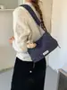 Bolsa de lona floral casual estilo coreano para mujer, nueva bolsa versátil 2026 para el hombro y cruzada para ir al trabajo, bolsa de mano de gran capacidad