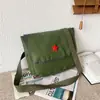 Mochila del Ejército Rojo, diseñada para servir al pueblo, una gran herramienta de aprendizaje, bolso cruzado, estilo vintage, mochila Verde Liberación, material de lona, diseño de cinco estrellas, mochila Lei Feng