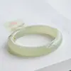 Fabricante de Productos Nuevos al por Mayor Material de Mongolia Exterior Pulsera de Jade Verde Blanco de Xinjiang para Mujer Banda Ancha Círculo Redondo Imitación de Jade Hetian Pulsera de Agua Clara