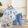 Ropa de verano para niños 2025 tie-dye estampado completo robot manga corta traje para niños de 2 años comercio exterior conjunto de dos piezas lote 1