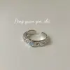 Anillo Suchuang S925 Plata de Ley Textura Piedra Lunar para Mujer Ins Sentido Avanzado Piedra Fluorescente Lava Anillo Estilo Frío