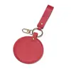 Espejo de cuero grueso en stock con gancho para colgar, se puede usar como accesorio de bolso, espejo de maquillaje redondo de cuero de color sólido, personalizable