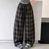 Calça de outono para meninas, nova coleção 2026, calça longa moderna estilo coreano para crianças maiores, calça xadrez versátil de perna larga