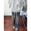 Jeans para hombre estilo americano, corte holgado, corte recto con un ligero ensanchamiento, diseño de corte diagonal, estilo boyfriend adelgazante, azul lavado vintage