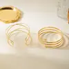 Nuevas Pulseras de Cruz Huecas Multicapa Transfronterizas, Pulseras de Brazo de Línea Metálica Abierta Sencillas de Nicho Europeas y Americanas al por Mayor