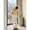 Base de tricô macia e delicada, cor amarelo leitoso, para mulheres, outono/inverno 2026, corte justo, ombro normal, suéter fino de manga longa, top interno
