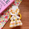 Corea del Sur lindo niños grande tela algodón cuadros enchufe algodón animal de dibujos animados cabeza pato clip corbata de moño aro grande para el pelo