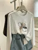 Diseño único, camiseta de algodón de manga larga con cuello redondo y estampado de copos de nieve para mujer, un estilo ligero de otoño que se puede usar como capa exterior, ofreciendo un look casual, juvenil y a la moda.
