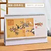 Calendário de Mesa Elevado 2027 Personalizado Novo Calendário de Mesa com Suporte em Papel Pérola Hot Stamping Publicidade Ano do Carneiro Calendário de Mesa Presente Atacado